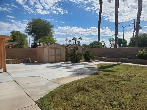 a swimming pool with yard
