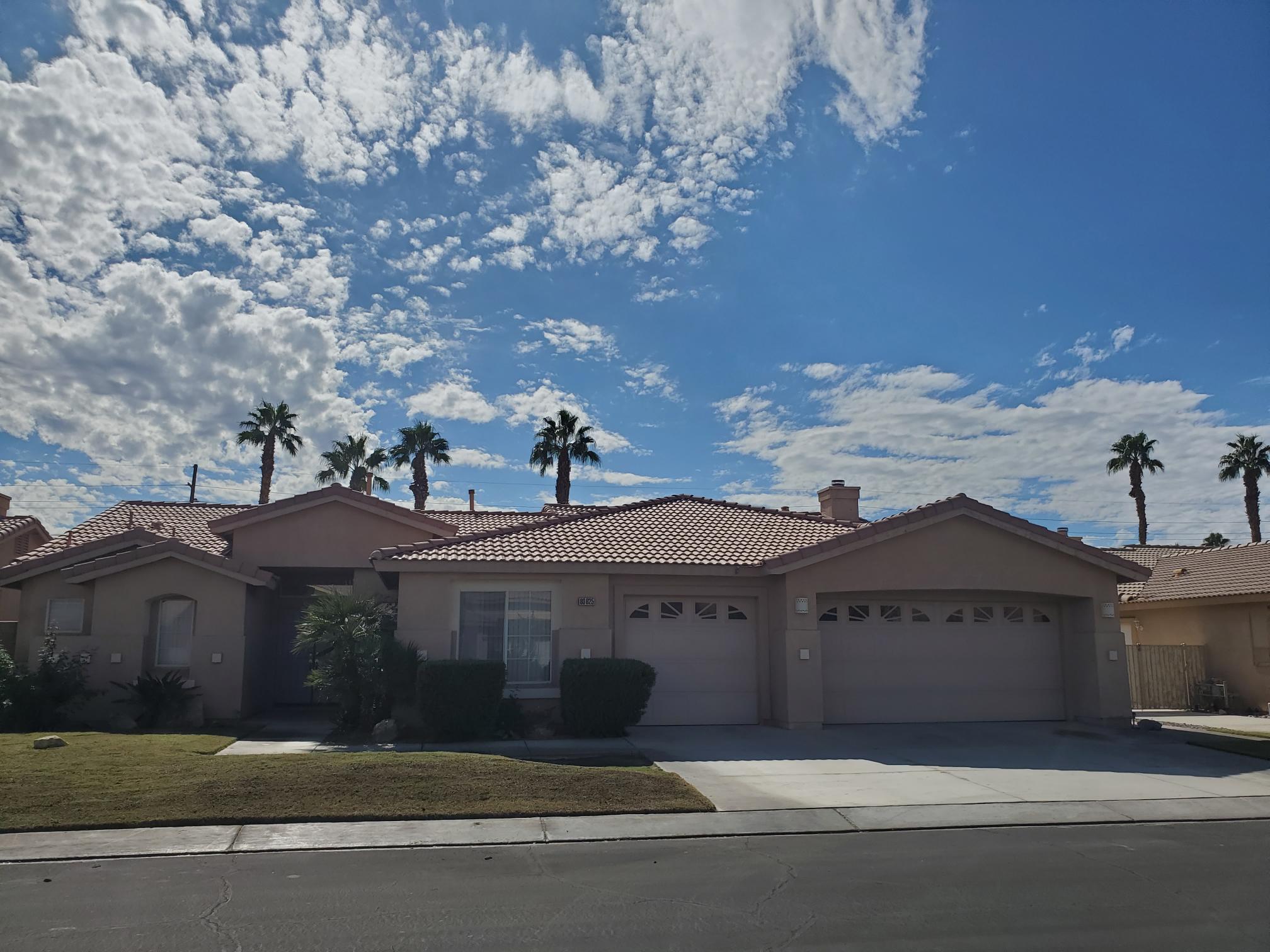 80625 Virginia Avenue Indio, CA 92201 - Photo 13 of 13 a view of house with a yard and a large tree