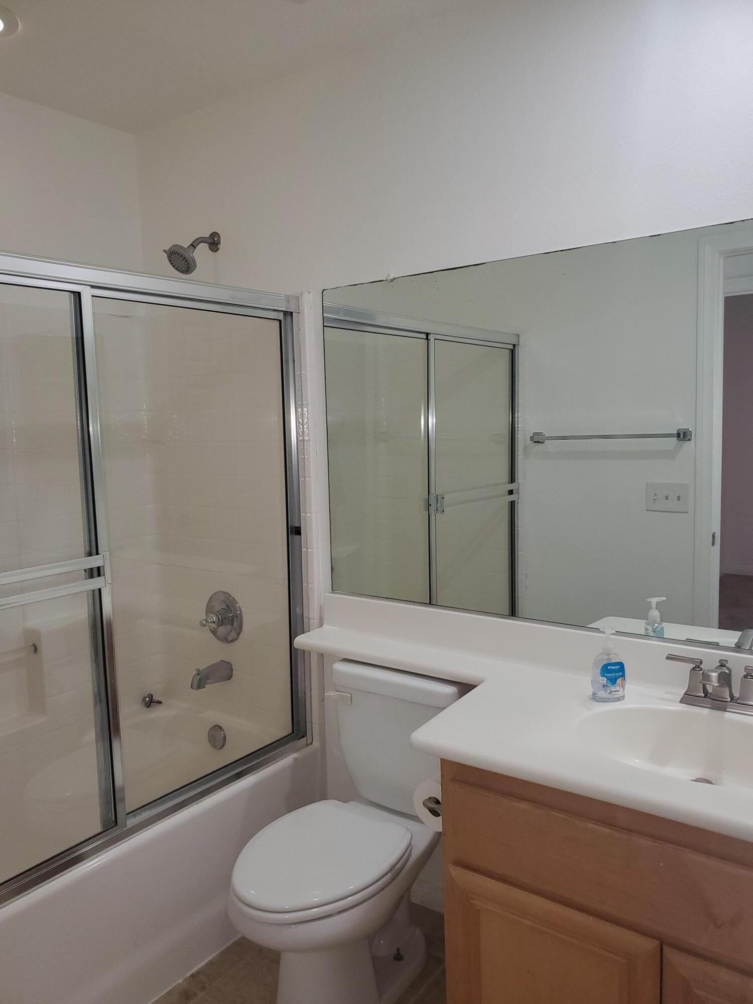 80625 Virginia Avenue Indio, CA 92201 - Photo 9 of 13 a bathroom with a sink a toilet and shower