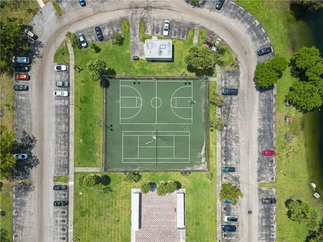 an aerial view of a house with a garden