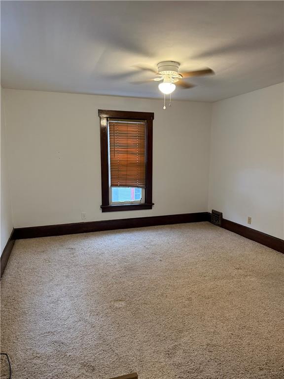 115 Lyon Avenue Butler, PA 16001 - Photo 21 of 32 an empty room with a empty space and windows