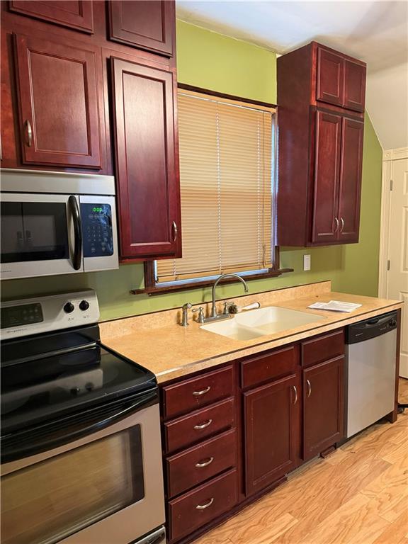 115 Lyon Avenue Butler, PA 16001 - Photo 6 of 32 a kitchen with stainless steel appliances granite countertop a sink and cabinets