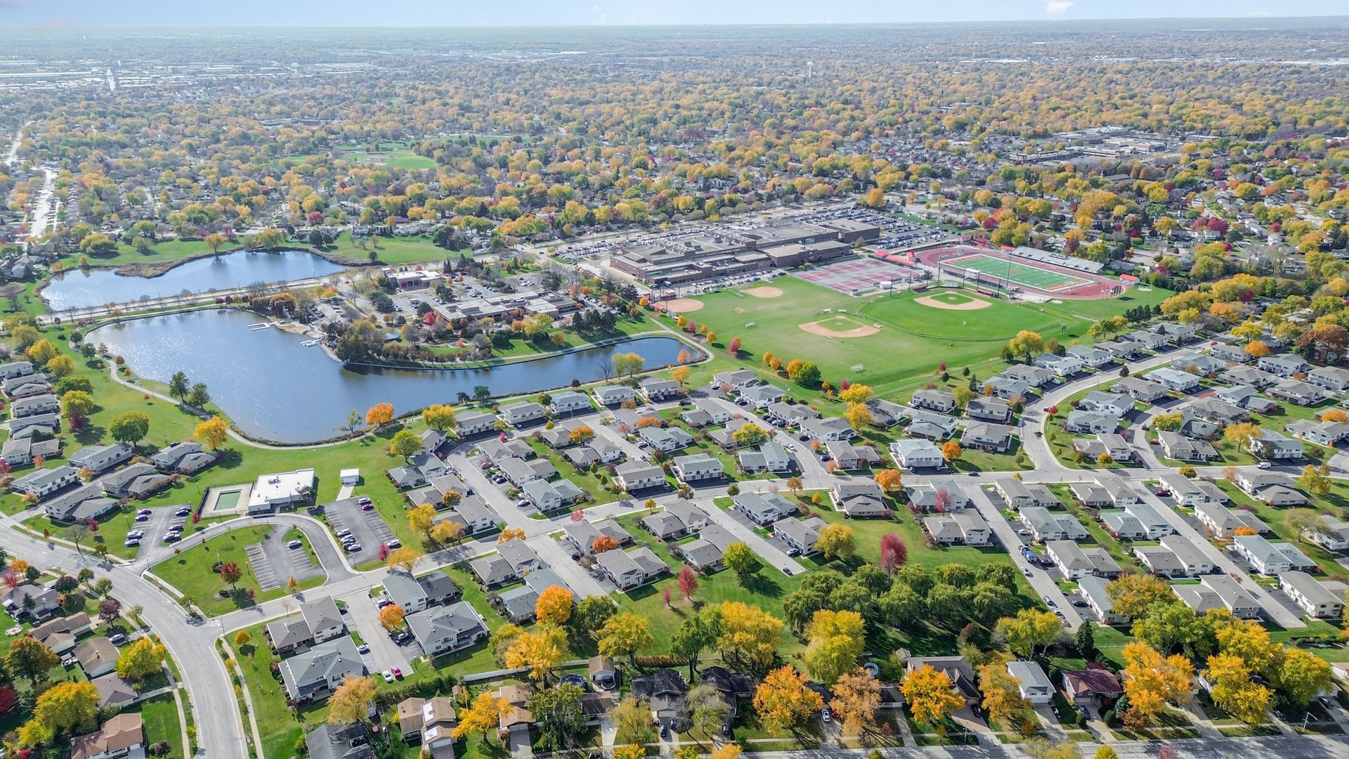 314 Covehill Court, Unit 314 Schaumburg, IL 60193 - Photo 18 of 18 an aerial view of residential houses with outdoor space and trees