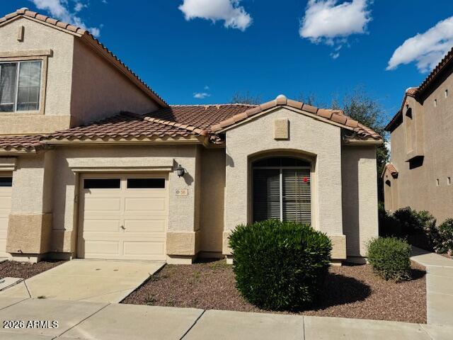 2600 East Springfield Place, Unit 58 Chandler, AZ 85286 - Photo 1 of 14 a front view of a house