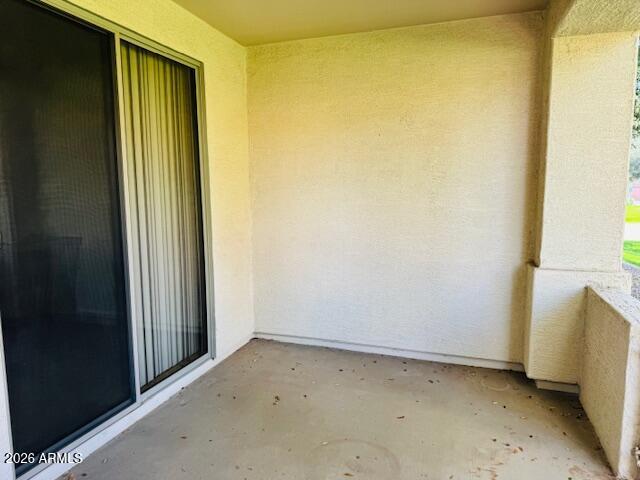 2600 East Springfield Place, Unit 58 Chandler, AZ 85286 - Photo 3 of 14 a view of a small space with wooden floor and a window