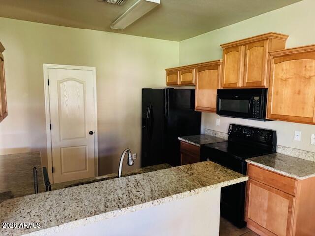 2600 East Springfield Place, Unit 58 Chandler, AZ 85286 - Photo 6 of 14 a kitchen with a refrigerator and a sink