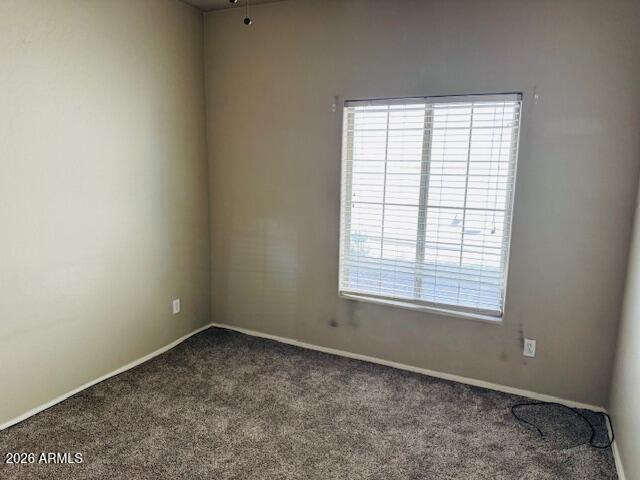 2600 East Springfield Place, Unit 58 Chandler, AZ 85286 - Photo 8 of 14 an empty room with a window