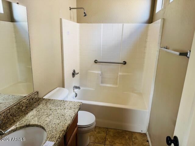 2600 East Springfield Place, Unit 58 Chandler, AZ 85286 - Photo 10 of 14 a bathroom with a granite countertop sink toilet and shower