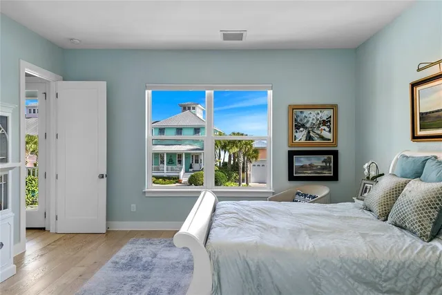 a bed room with a bed and a window