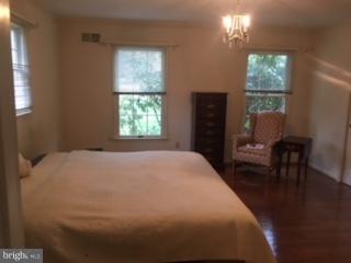 8491 Reservoir Road Fulton, MD 20759 - Photo 5 of 18 Hardwood flooring, crown molding, two closets