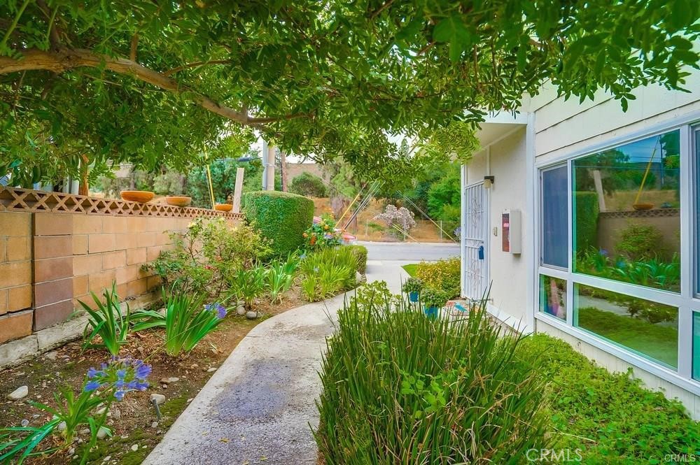 1434 Highland Avenue, Unit 13 Duarte, CA 91010 - Photo 1 of 14 a view of a garden with plants