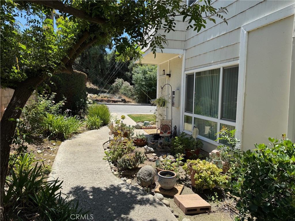 1434 Highland Avenue, Unit 13 Duarte, CA 91010 - Photo 2 of 14 a view of a garden with a flower garden