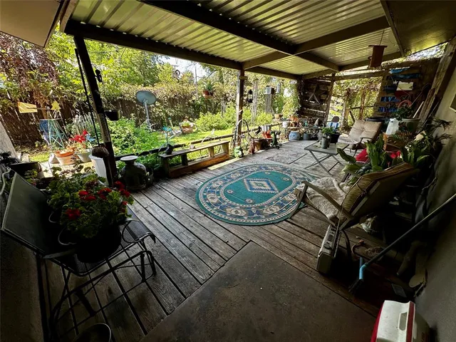 a view of a porch with furniture