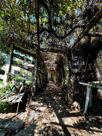 a backyard of a house with lots of green space