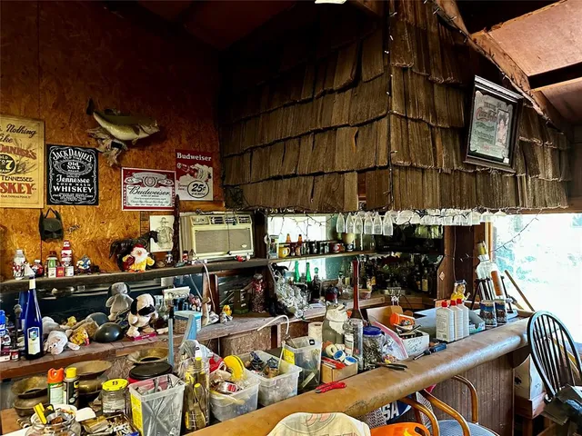 a toilet sitting on top of a oven