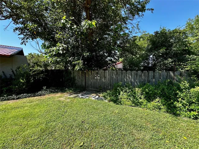 a view of outdoor space and yard
