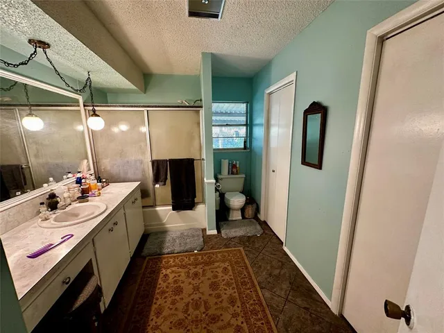 a bathroom with sink and mirror