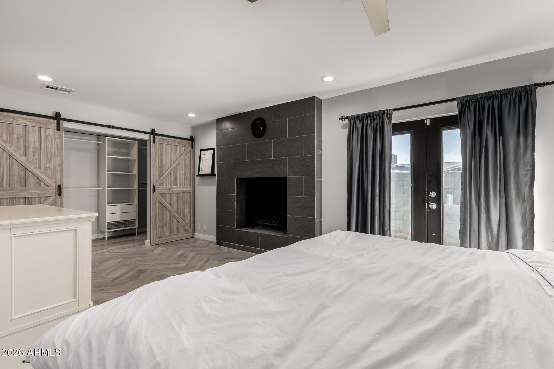 2402 North 37th Street Phoenix, AZ 85008 - Photo 17 of 44 a large white room with closet and a fireplace