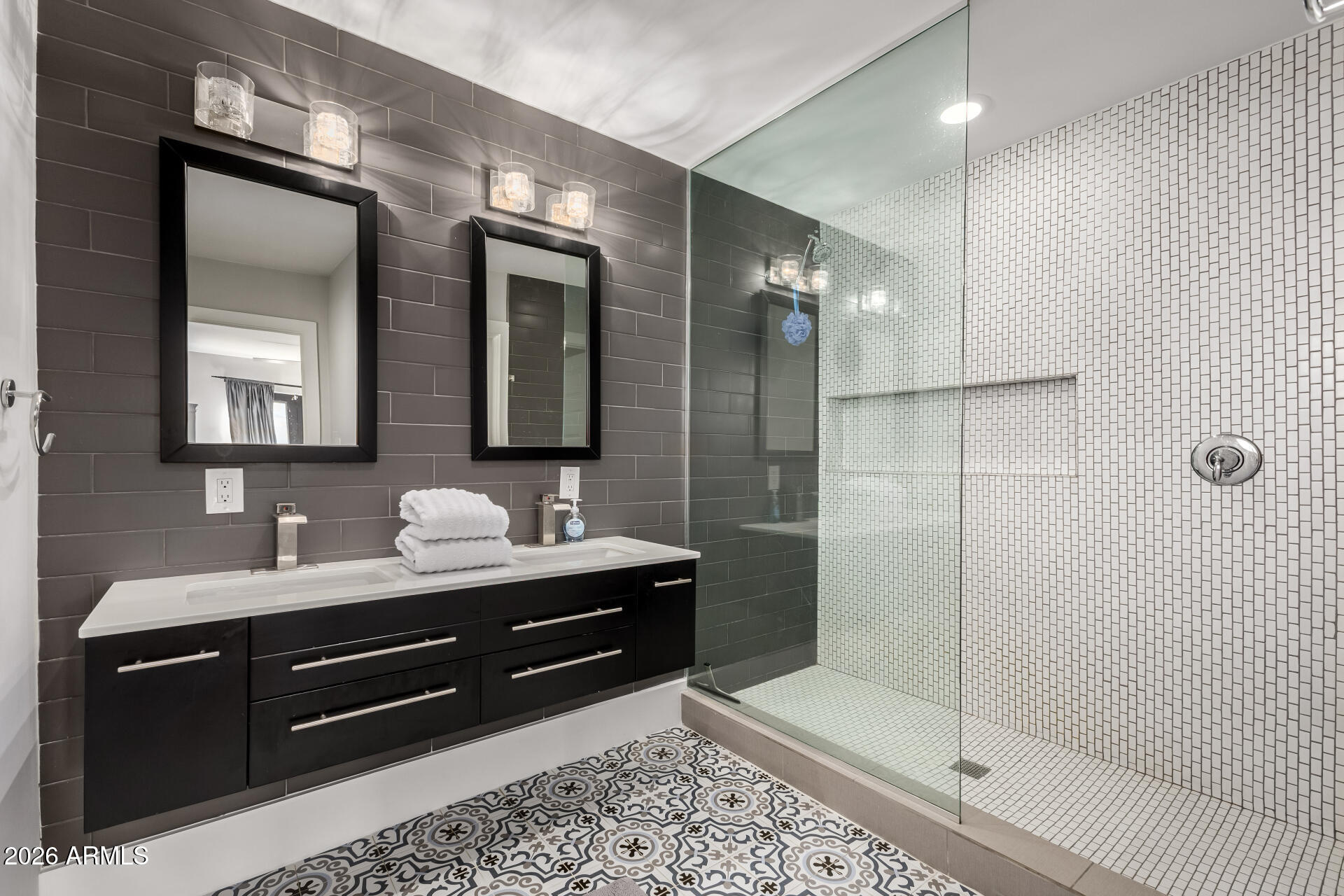 2402 North 37th Street Phoenix, AZ 85008 - Photo 20 of 44 a bathroom with a double vanity sink mirror and shower