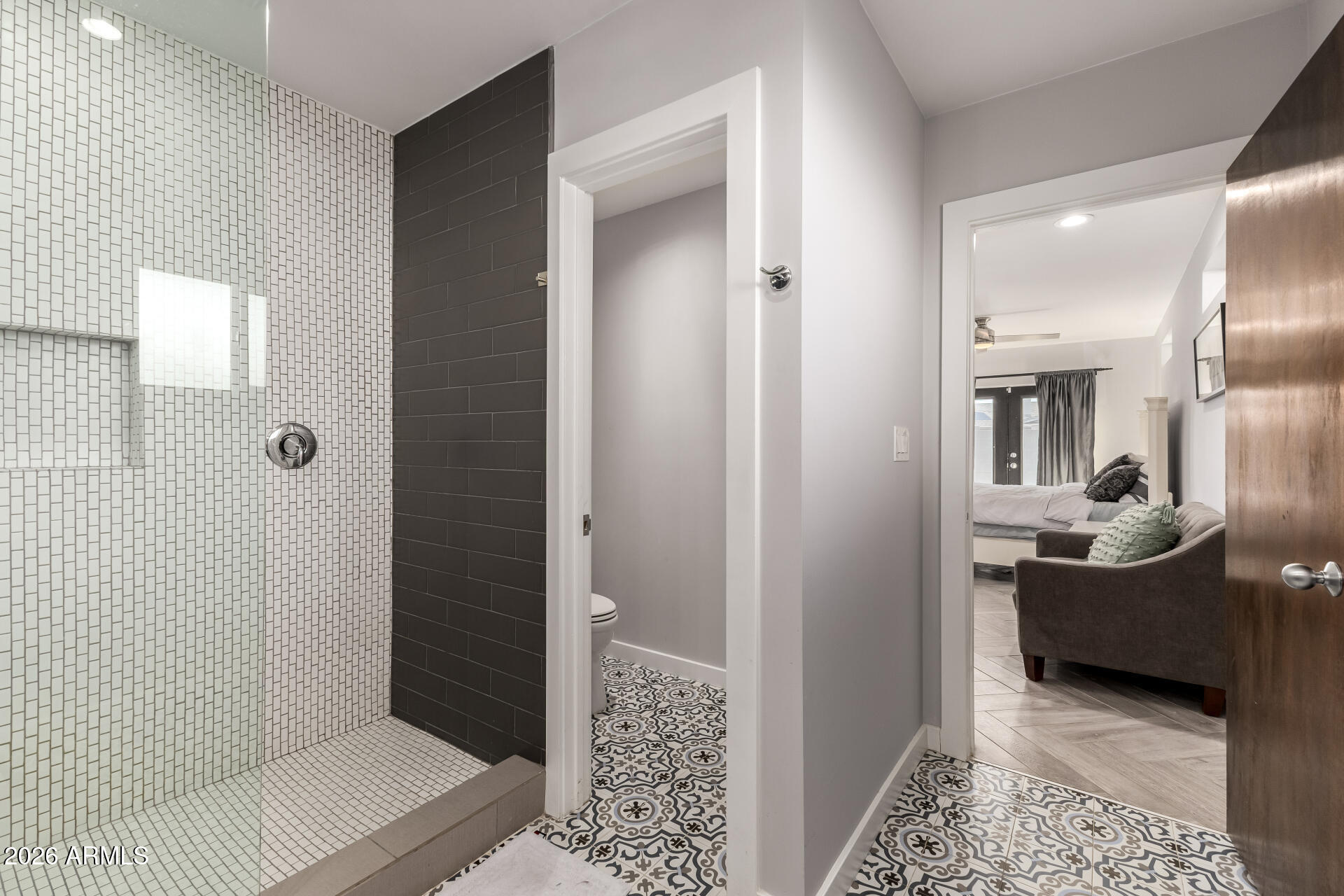 2402 North 37th Street Phoenix, AZ 85008 - Photo 21 of 44 a bathroom with a sink and shower