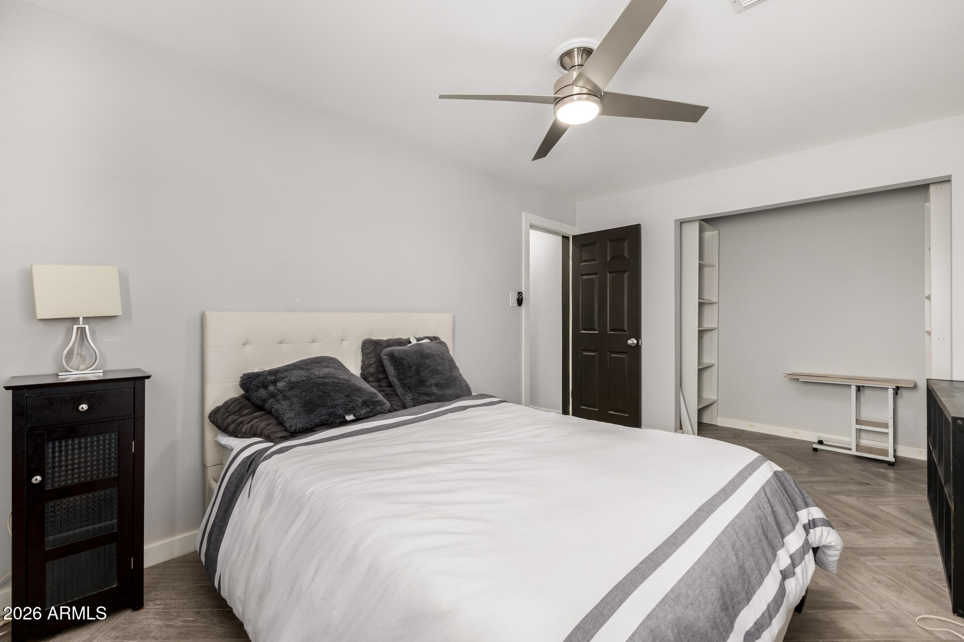 2402 North 37th Street Phoenix, AZ 85008 - Photo 27 of 44 a bedroom with a bed and a table