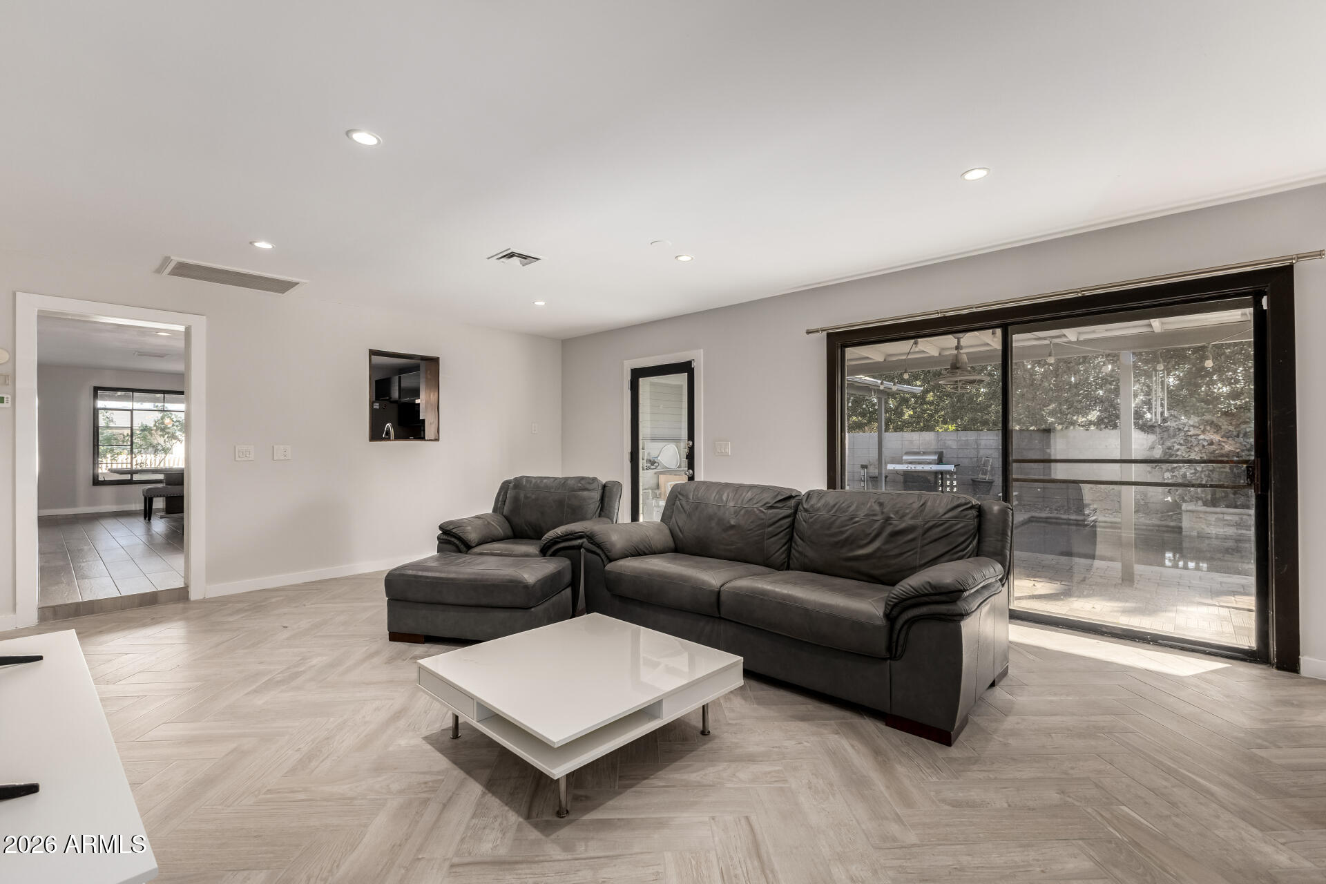 2402 North 37th Street Phoenix, AZ 85008 - Photo 6 of 44 a living room with furniture and a large window
