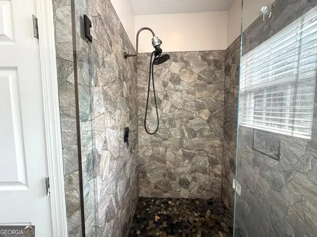 a bathroom with a shower