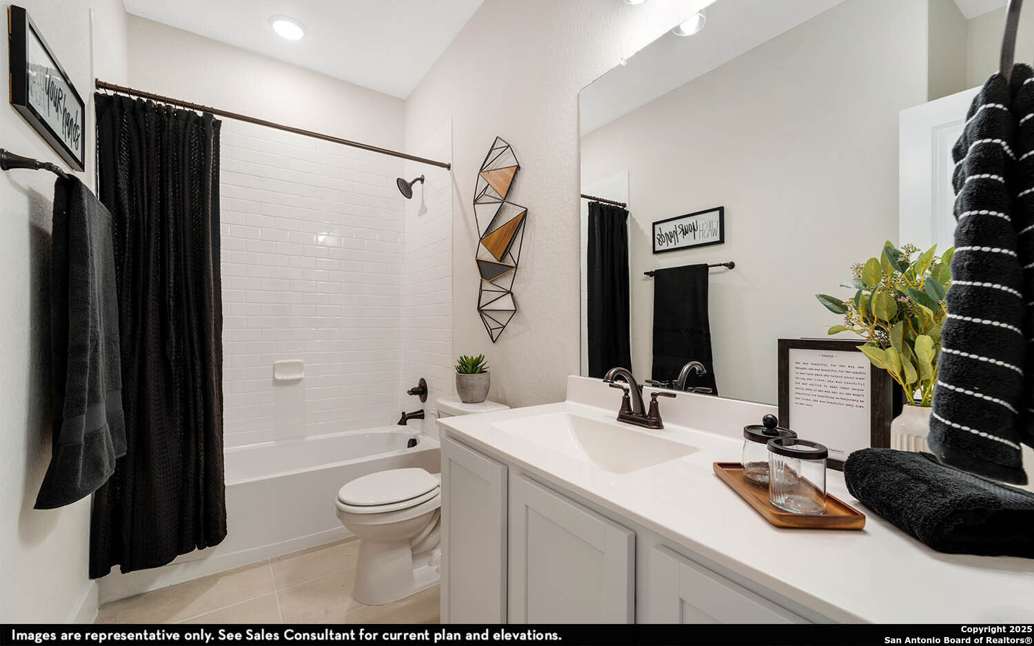 408 Jills Path Seguin, TX 78155 - Photo 22 of 25 a bathroom with a sink and a mirror