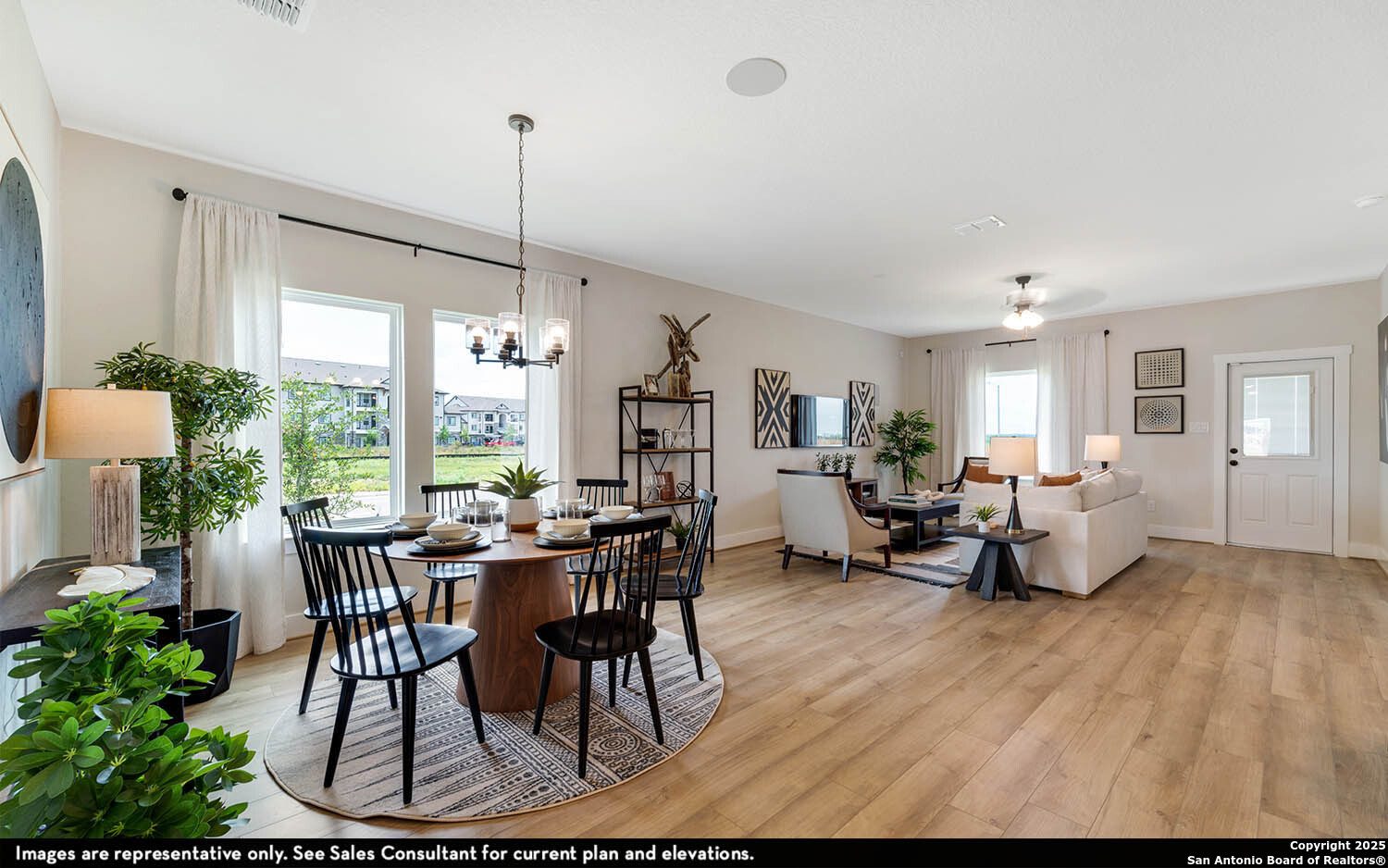 408 Jills Path Seguin, TX 78155 - Photo 8 of 25 a view of a dining room with furniture window and wooden floor