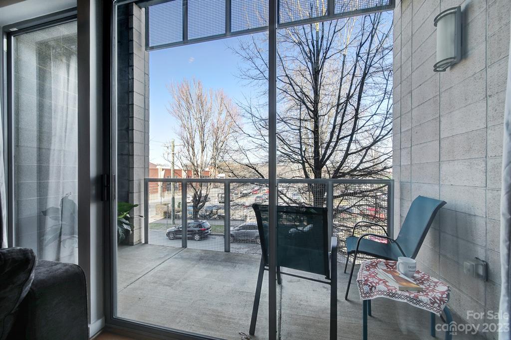 2116 McClintock Road, Unit 122 Charlotte, NC 28205 - Photo 11 of 27 a view of balcony and patio