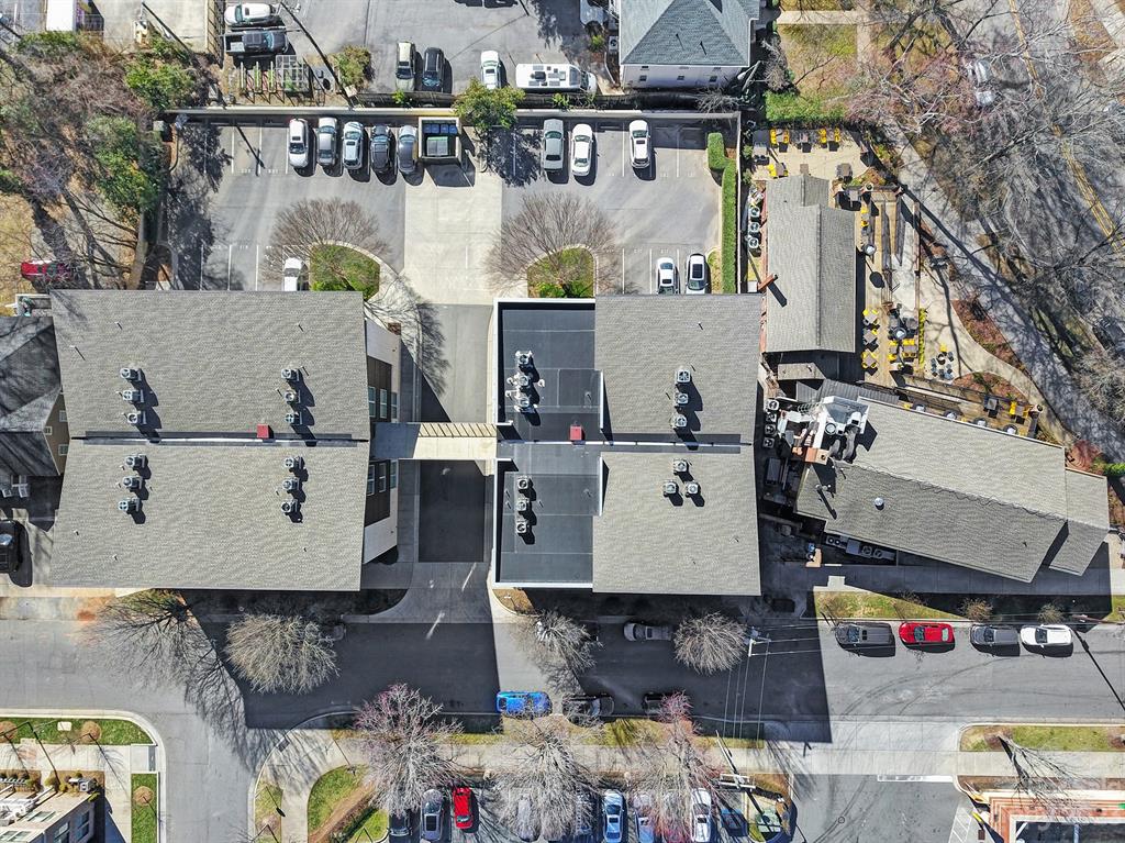 2116 McClintock Road, Unit 122 Charlotte, NC 28205 - Photo 25 of 27 an aerial view of a house with swimming pool