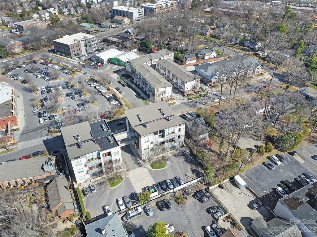 2116 McClintock Road, Unit 122 Charlotte, NC 28205 - Photo 26 of 27 an aerial view of a city with lots of residential buildings