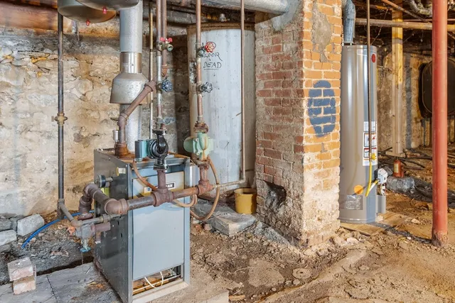 a clock on a wall next to a wall