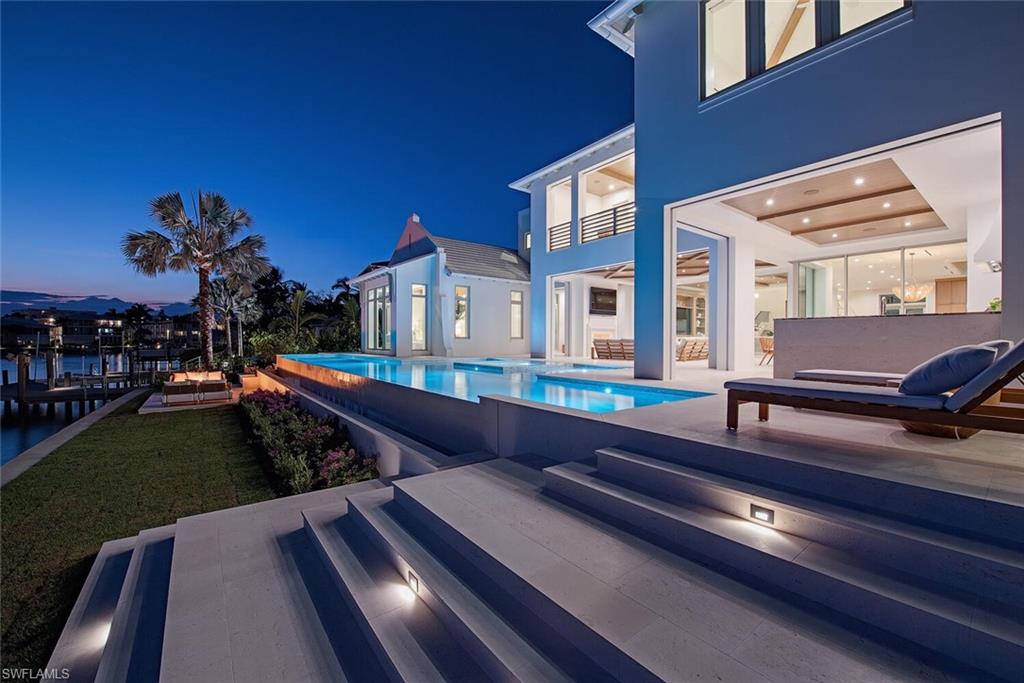 306 Springline Drive Naples, FL 34102 - Photo 2 of 50