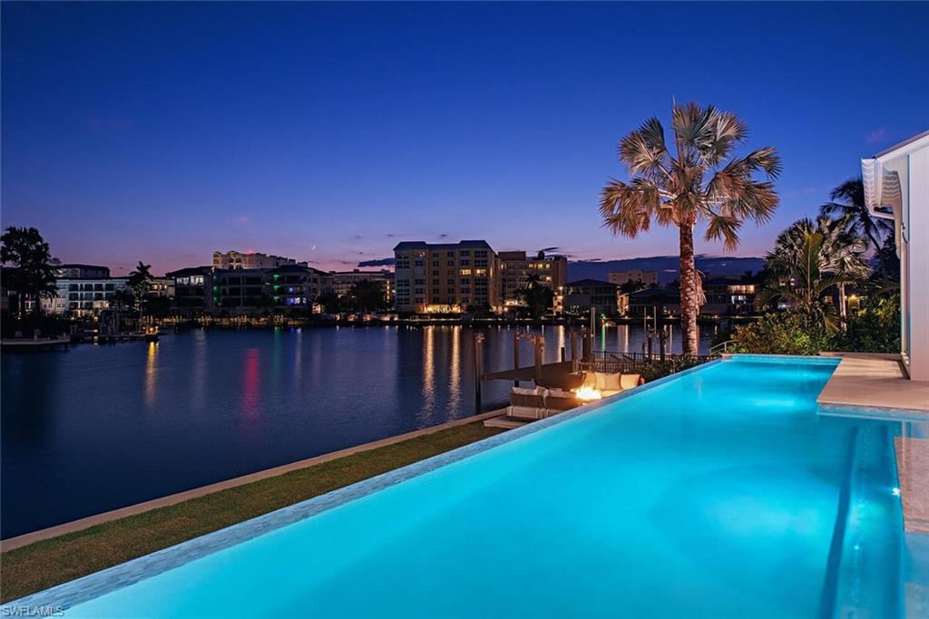 306 Springline Drive Naples, FL 34102 - Photo 3 of 50 Lap Pool With SW Exposure