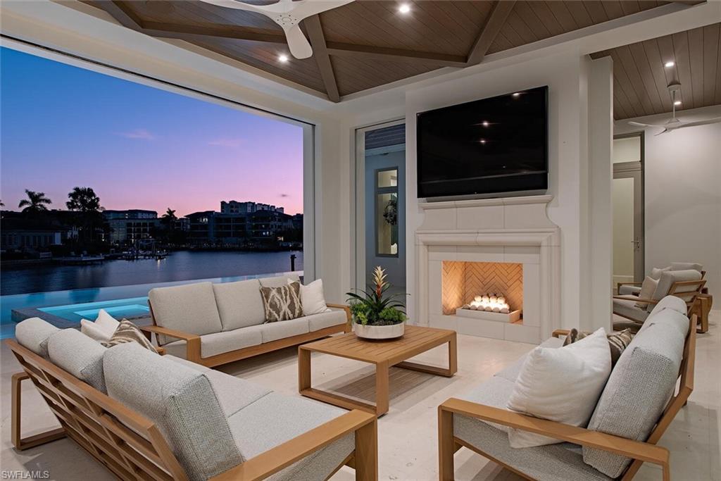 306 Springline Drive Naples, FL 34102 - Photo 4 of 50 First Level Covered Outdoor Living