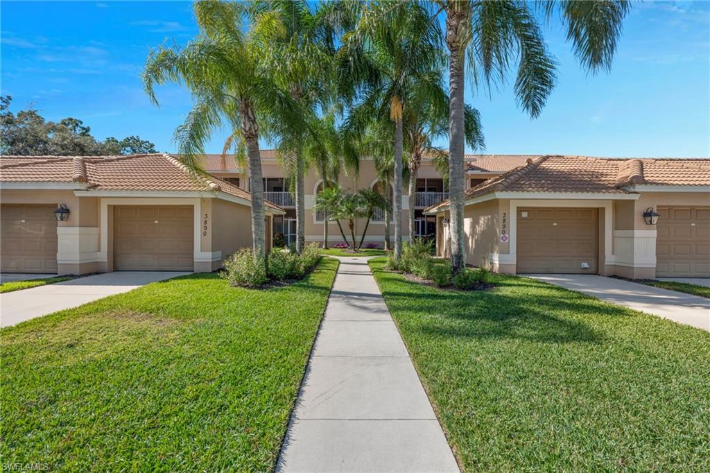 3890 Sawgrass Way, Unit 2324 Naples, FL 34112 - Photo 18 of 18 One-Car Garage, is Far Right.