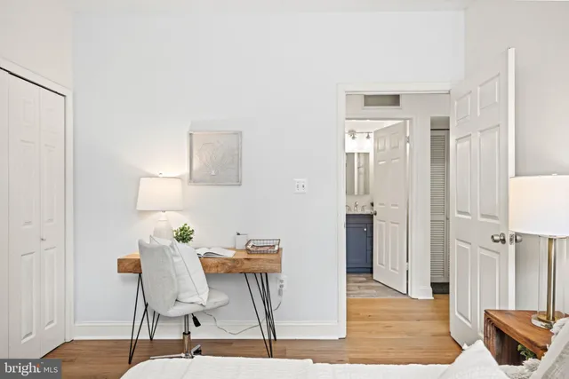 a view of a livingroom with furniture and wooden floor