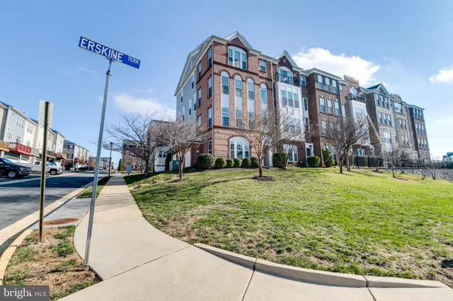 a view of a building with a yard