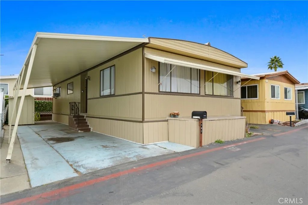 23701 South Western Avenue, Unit 197 Torrance, CA 90501 - Photo 27 of 32 a view of a front of house with a street