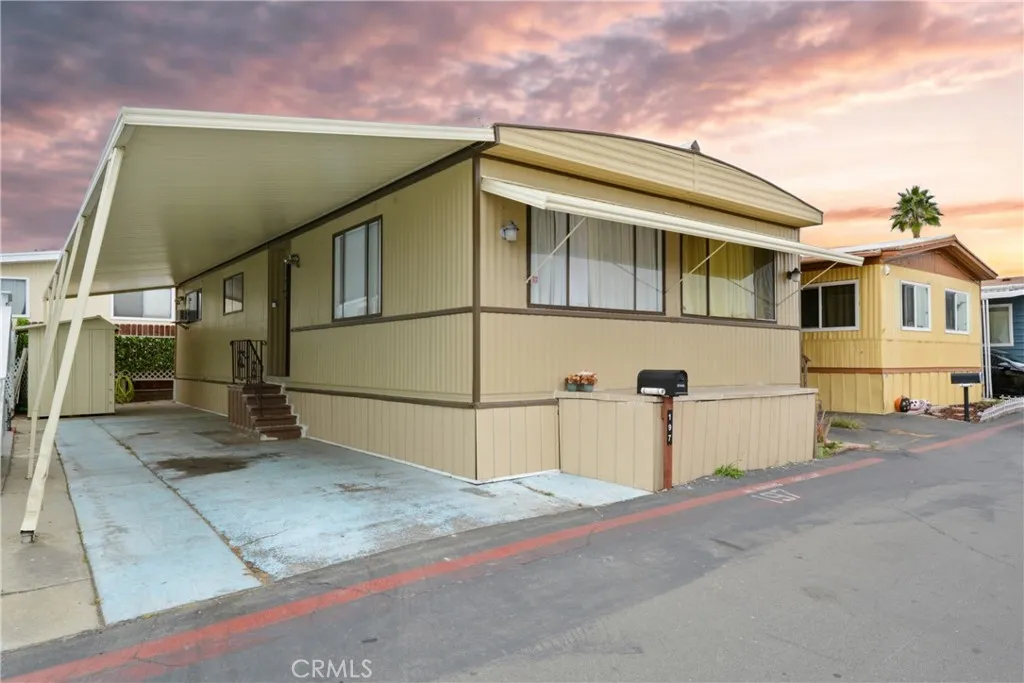 23701 South Western Avenue, Unit 197 Torrance, CA 90501 - Photo 30 of 32 a view of a front of house with a street