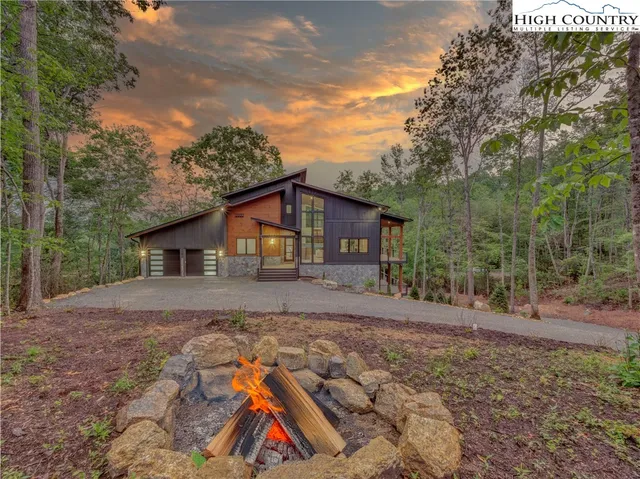 a backyard of a house with seating space