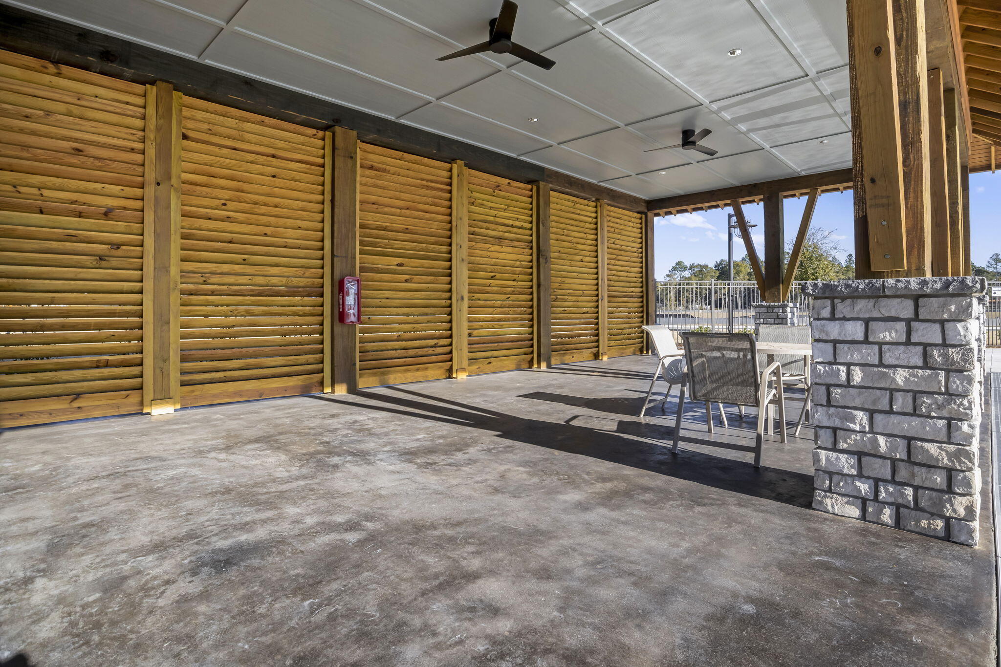 8130 Fir Tree Drive Milton, FL 32583 - Photo 20 of 37 a view of a room with balcony and furniture