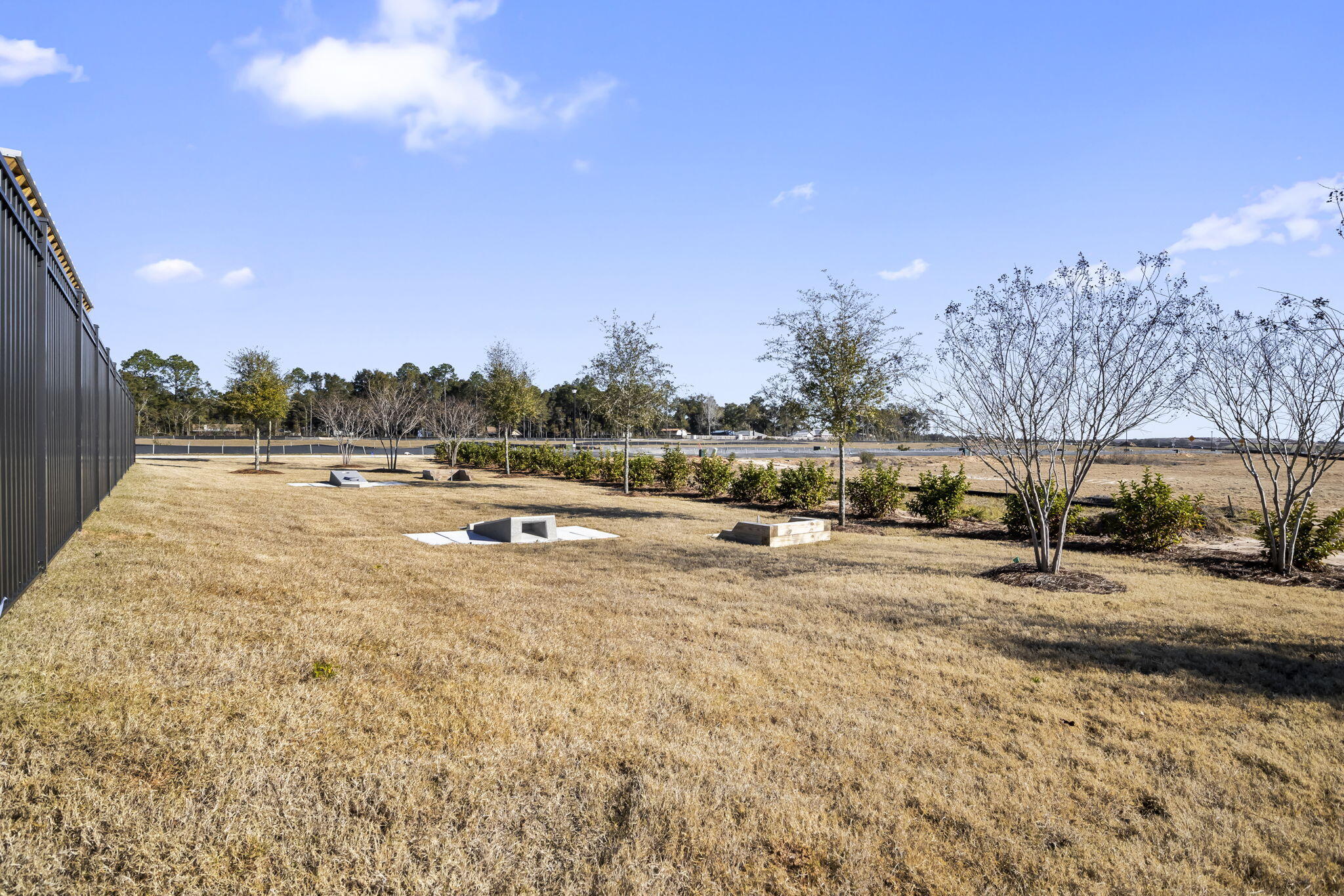 8130 Fir Tree Drive Milton, FL 32583 - Photo 31 of 37 a view of a lake with houses