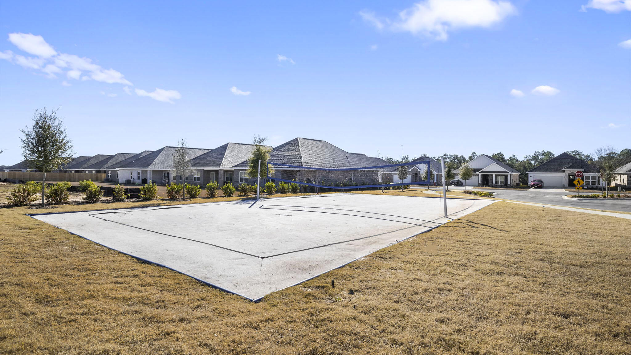 8130 Fir Tree Drive Milton, FL 32583 - Photo 36 of 37 a view of multiple houses with a swimming pool