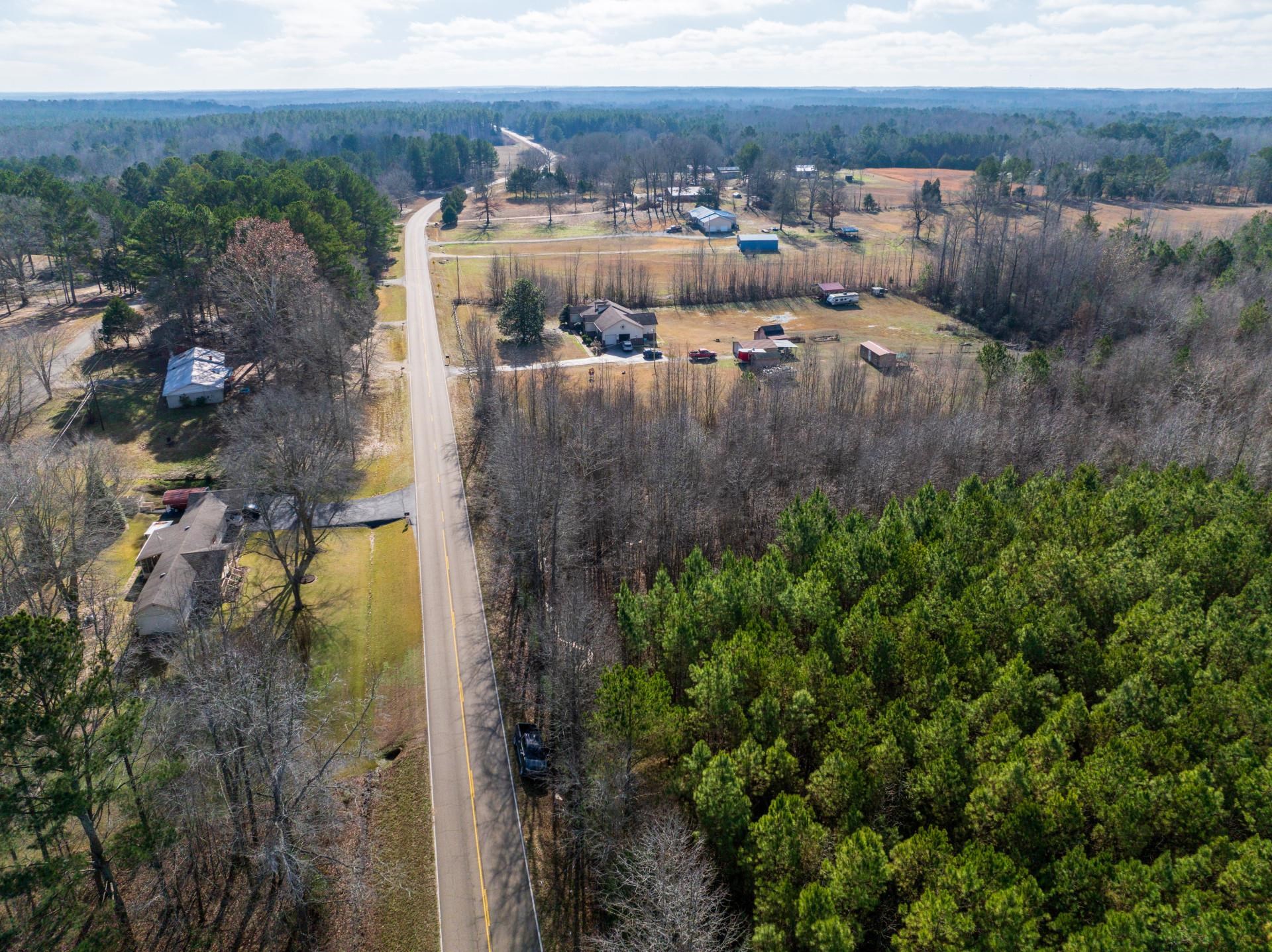 0 County Road 992 Road Iuka, MS 38852 - Photo 16 of 17 Drone / aerial view featuring a rural view and a view of trees