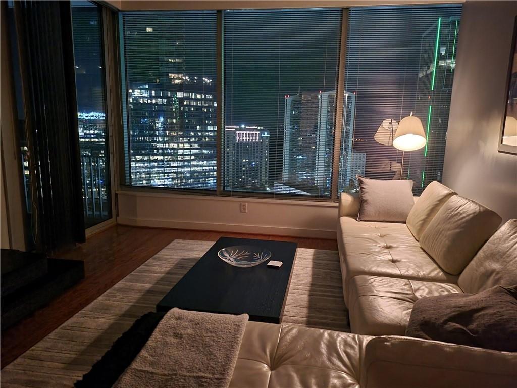 3338 Peachtree Road Northeast, Unit 3006 Atlanta, GA 30326 - Photo 3 of 35 a living room with furniture