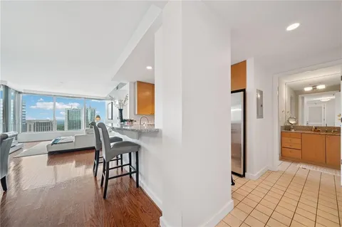 a view of a livingroom with furniture and a table