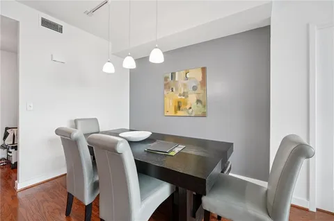 a view of a dining room with furniture