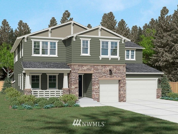 21830 33rd Drive Southeast, Unit 6 Bothell, WA 98021 - Photo 1 of 25 a front view of a house with a garden